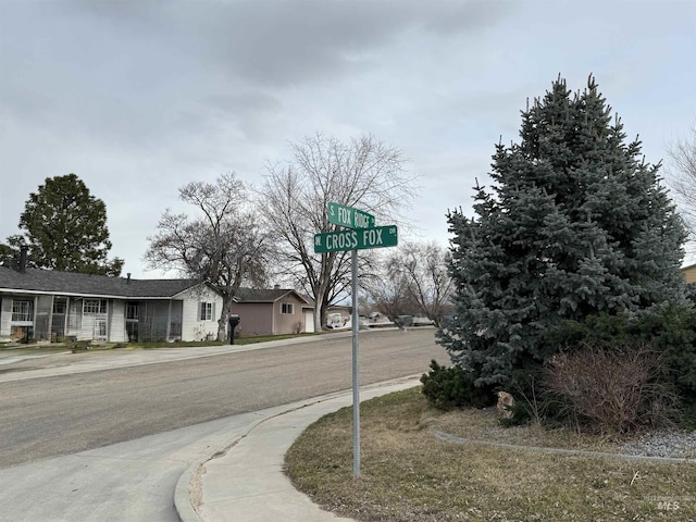 view of road featuring curbs and sidewalks