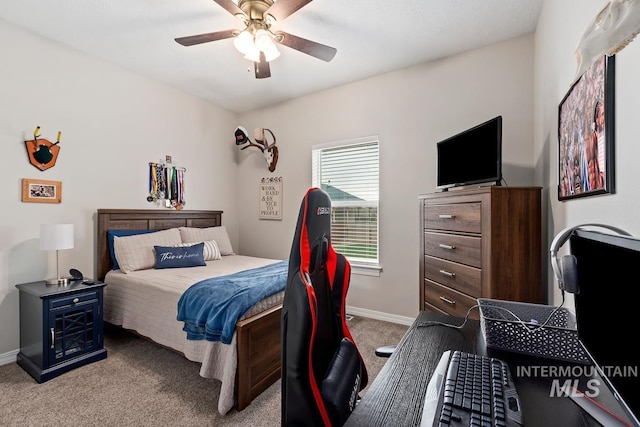 carpeted bedroom with ceiling fan