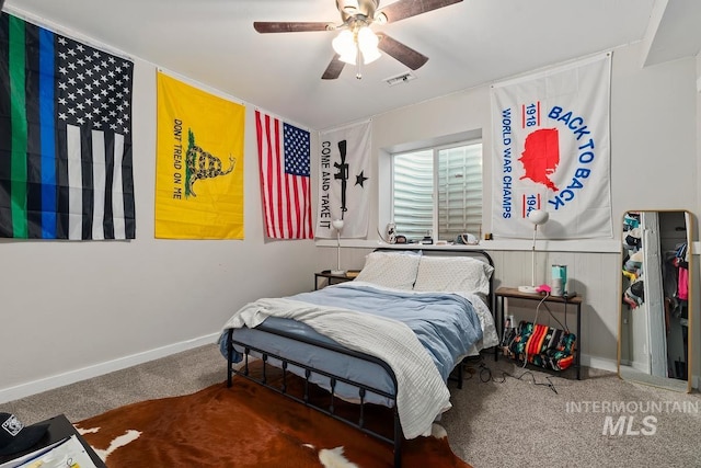 carpeted bedroom with ceiling fan