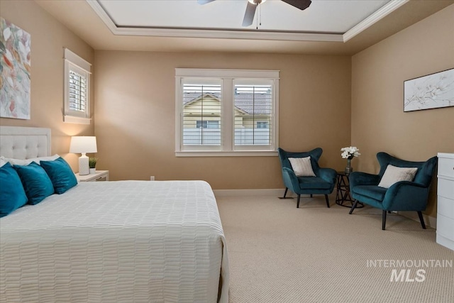 bedroom featuring baseboards, multiple windows, carpet flooring, and a ceiling fan