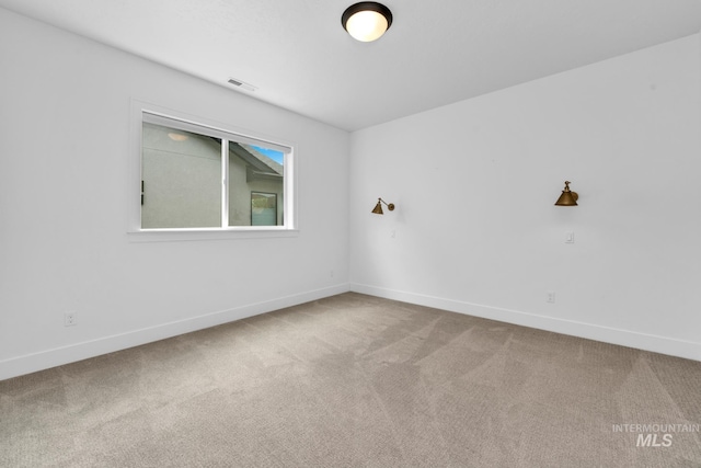 7060 E La Cuesta St, Boise, ID 83716 - carpeted spare room with baseboards