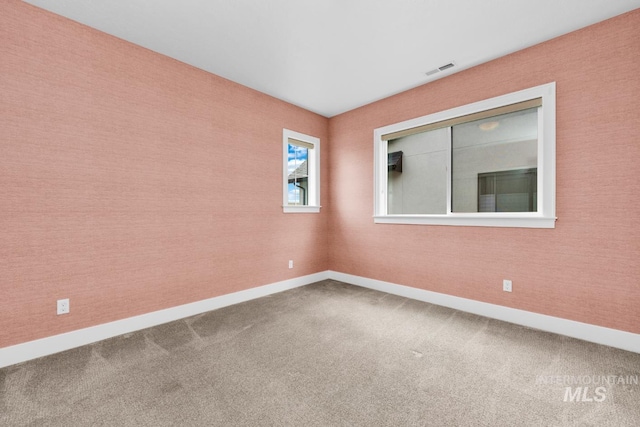 7060 E La Cuesta St, Boise, ID 83716 - spare room with carpet flooring and baseboards