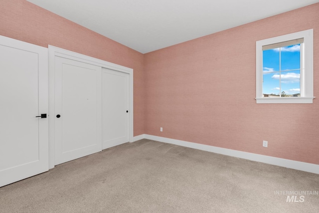 7060 E La Cuesta St, Boise, ID 83716 - unfurnished bedroom with carpet flooring, a closet, and baseboards