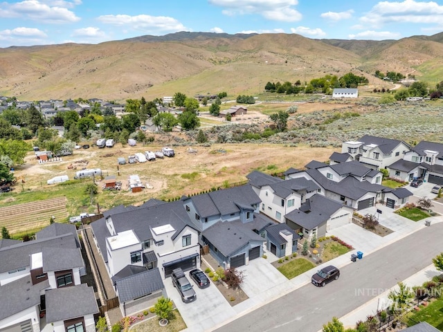 7060 E La Cuesta St, Boise, ID 83716 - aerial view of residential area with a mountain backdrop
