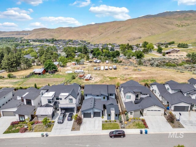 7060 E La Cuesta St, Boise, ID 83716 - aerial perspective of suburban area with mountains