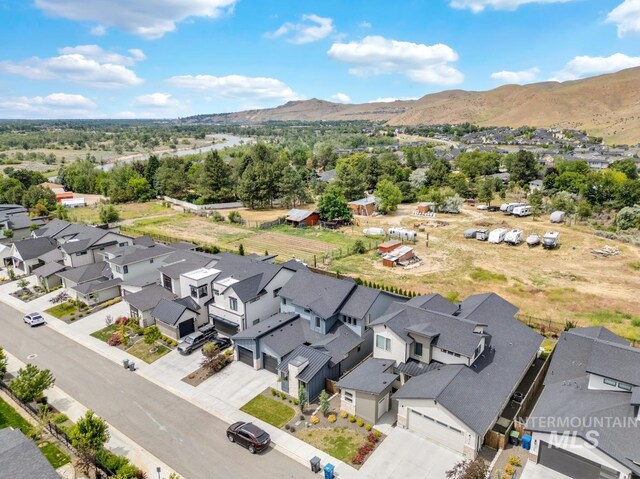 7060 E La Cuesta St, Boise, ID 83716 - aerial perspective of suburban area with a mountainous background