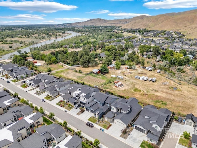 7060 E La Cuesta St, Boise, ID 83716 - aerial view of residential area featuring a water and mountain view