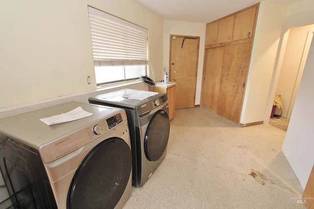 laundry room with laundry area and washer and dryer