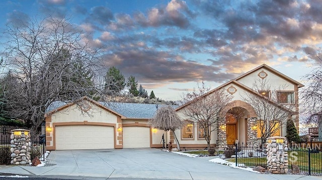 view of front of property with a garage