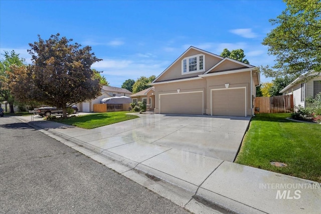 traditional home with concrete driveway, stucco siding, and an attached garage