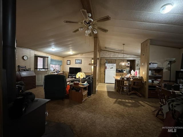 46 Aspen Way, Lowman, ID 83637 - carpeted living room featuring an office area, a ceiling fan, and vaulted ceiling