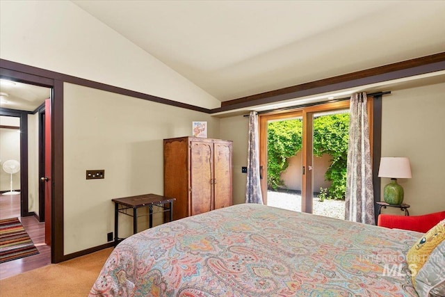 bedroom featuring baseboards, light colored carpet, access to exterior, and vaulted ceiling