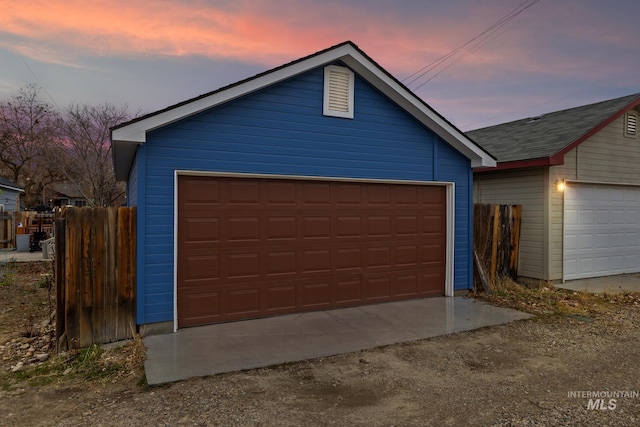 view of front of home featuring an outbuilding and a garage