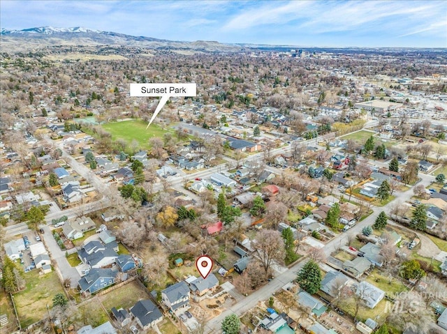 drone / aerial view featuring a mountain view and a residential view