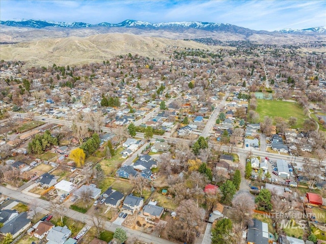 drone / aerial view with a mountain view and a residential view