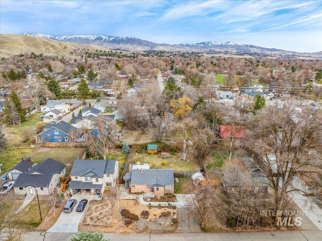 birds eye view of property featuring a residential view and a mountain view