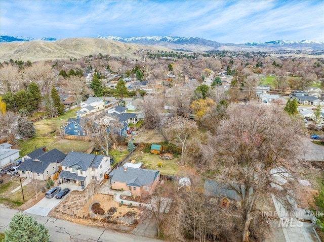 birds eye view of property featuring a mountain view and a residential view