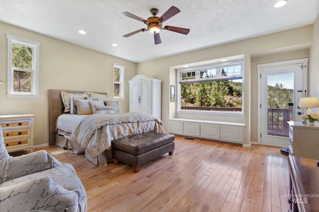 bedroom featuring access to exterior, recessed lighting, ceiling fan, and light wood-style flooring