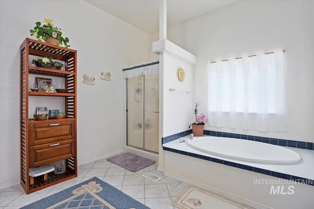 321 S 600 E, Jerome, ID 83338 - full bathroom featuring a shower stall, tile patterned flooring, and a bath