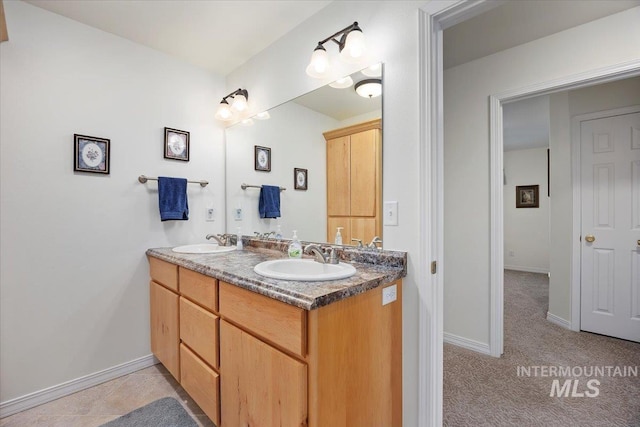 321 S 600 E, Jerome, ID 83338 - bathroom with baseboards and double vanity