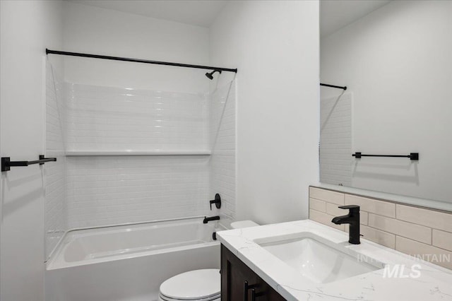 6312 W Pewter Point St, Meridian, ID 83646 - bathroom featuring tasteful backsplash, vanity, toilet, and bathtub / shower combination