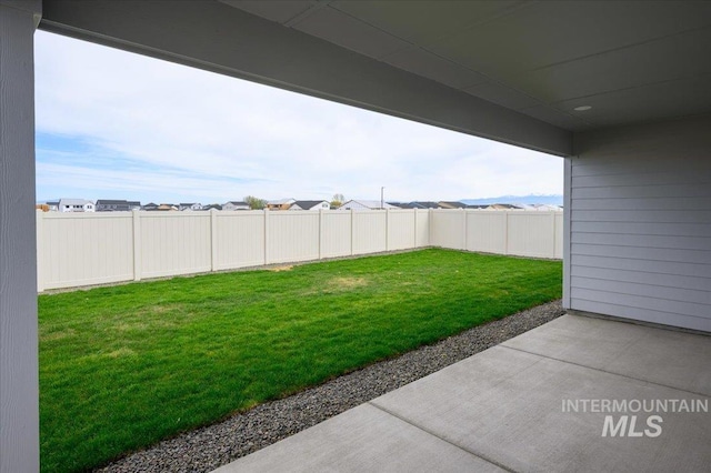 6312 W Pewter Point St, Meridian, ID 83646 - view of yard featuring a fenced backyard and a patio area