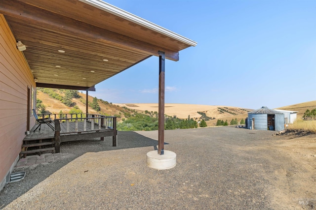 view of patio featuring a wooden deck