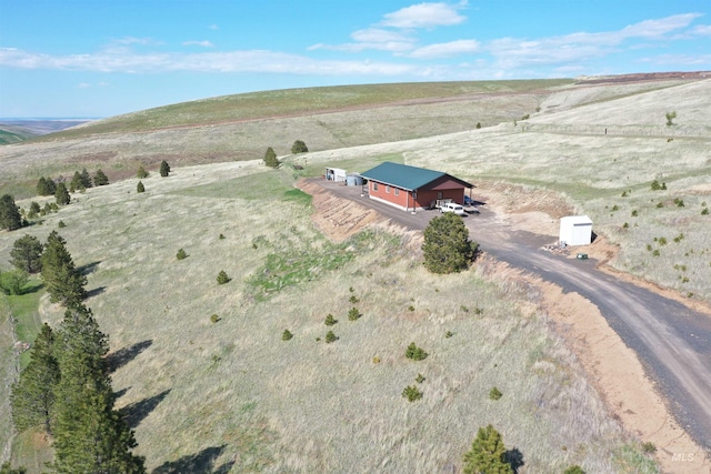 birds eye view of property featuring a rural view