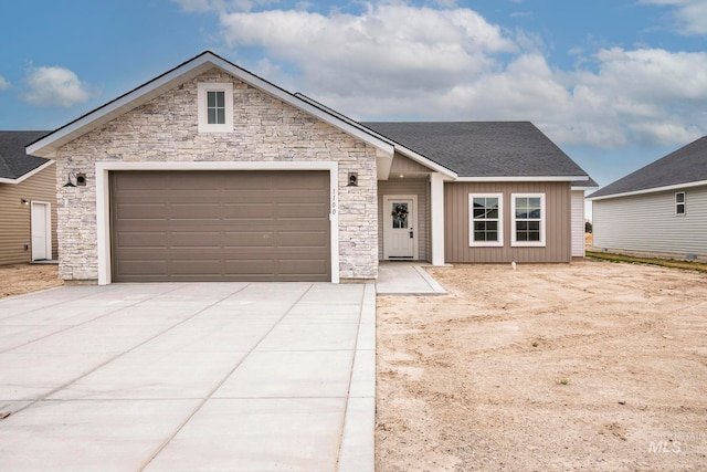 1100 Tanglewood St, Burley, ID 83318 - ranch-style home with driveway, an attached garage, board and batten siding, and roof with shingles