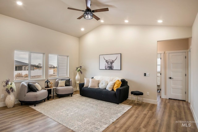 1100 Tanglewood St, Burley, ID 83318 - living area with lofted ceiling, recessed lighting, baseboards, ceiling fan, and wood finished floors