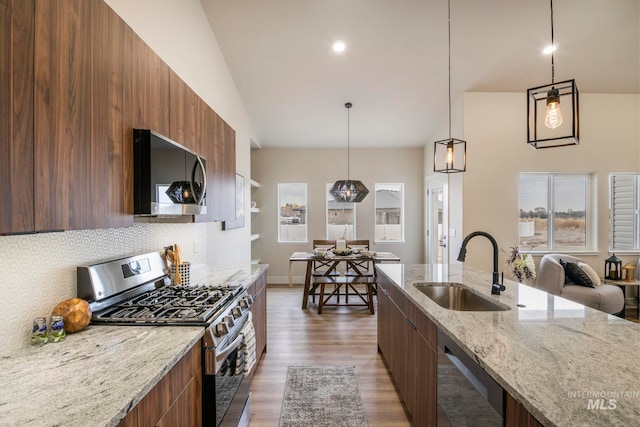 1100 Tanglewood St, Burley, ID 83318 - kitchen featuring modern cabinets, a sink, and gas stove