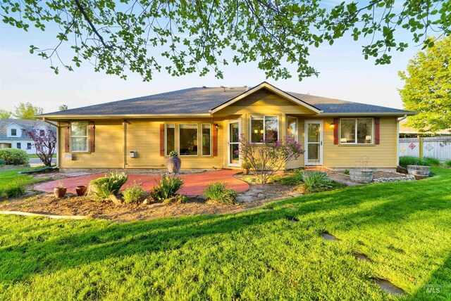 back of property featuring a wooden deck