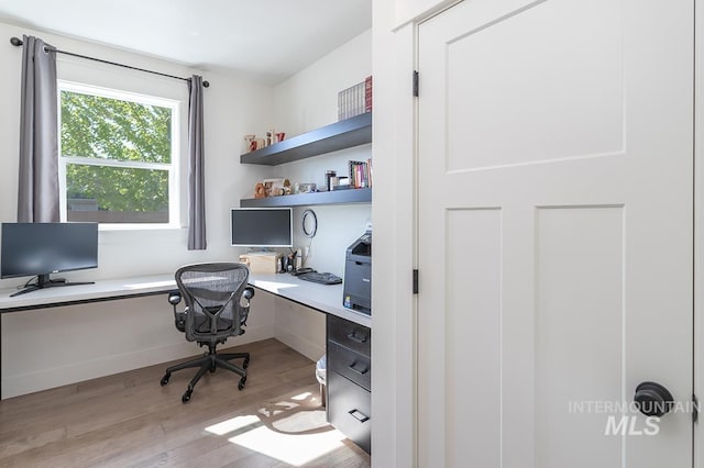 3713 W Ladle Rapids St, Meridian, ID 83646 - office featuring light wood-style floors and built in desk