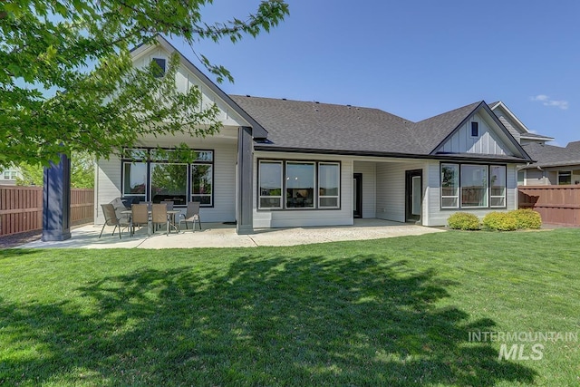 3713 W Ladle Rapids St, Meridian, ID 83646 - back of property with a yard, a patio, and fence