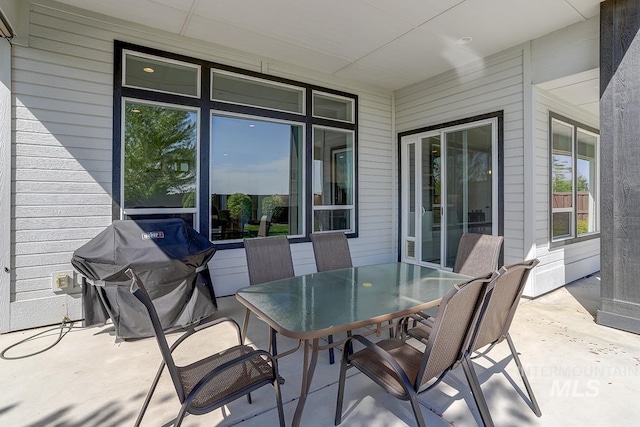 3713 W Ladle Rapids St, Meridian, ID 83646 - view of patio featuring outdoor dining area and grilling area