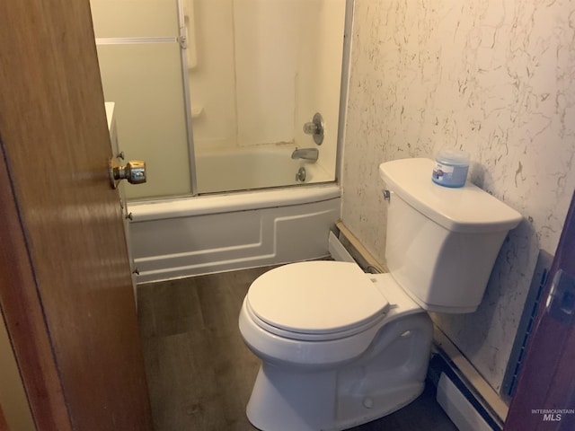 bathroom featuring bath / shower combo with glass door, wood-type flooring, and toilet