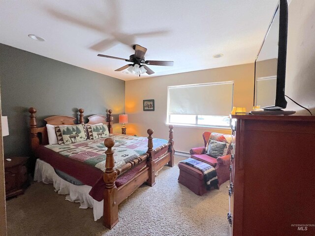 carpeted bedroom featuring a ceiling fan
