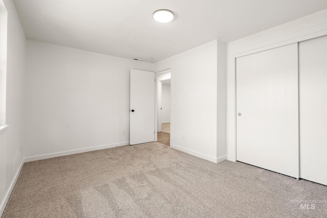 64 Borah, Nampa, ID 83651 - unfurnished bedroom featuring carpet floors, baseboards, and a closet