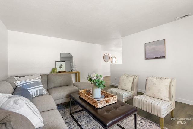 64 Borah, Nampa, ID 83651 - living area with dark wood-style floors and baseboards