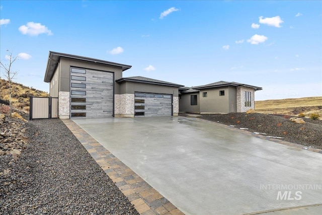 prairie-style house featuring a garage