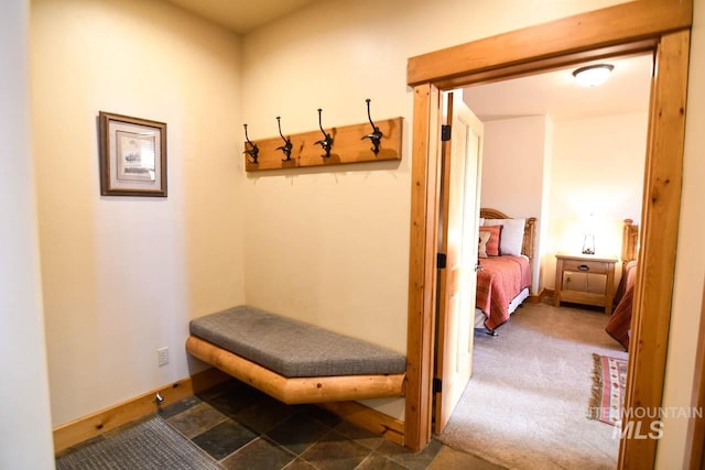 mudroom featuring baseboards