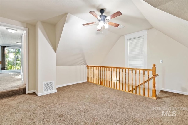316 Maple Ave, Emmett, ID 83617 - bonus room featuring carpet, vaulted ceiling, ceiling fan, and baseboards