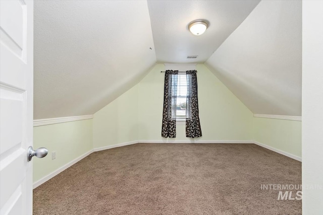 316 Maple Ave, Emmett, ID 83617 - bonus room featuring carpet flooring, lofted ceiling, and baseboards
