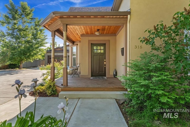316 Maple Ave, Emmett, ID 83617 - property entrance with stucco siding and a porch