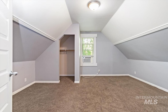 316 Maple Ave, Emmett, ID 83617 - additional living space with carpet floors, lofted ceiling, baseboards, and cooling unit
