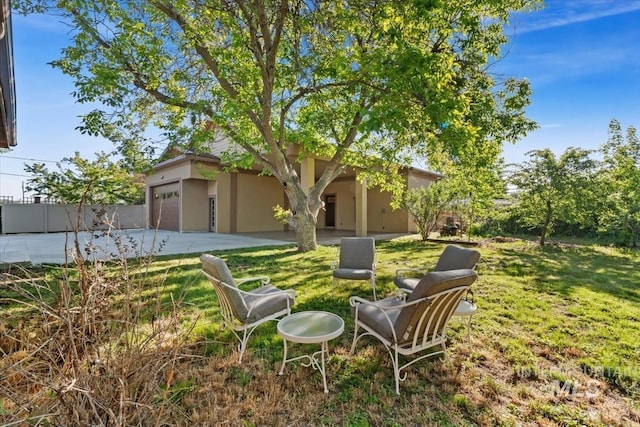 316 Maple Ave, Emmett, ID 83617 - view of yard featuring concrete driveway and a garage