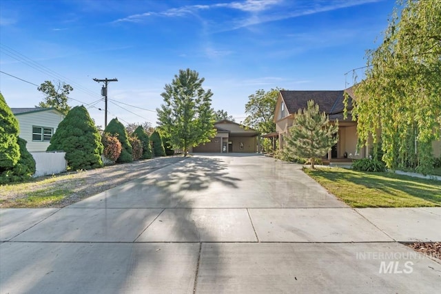 316 Maple Ave, Emmett, ID 83617 - obstructed view of property with concrete driveway