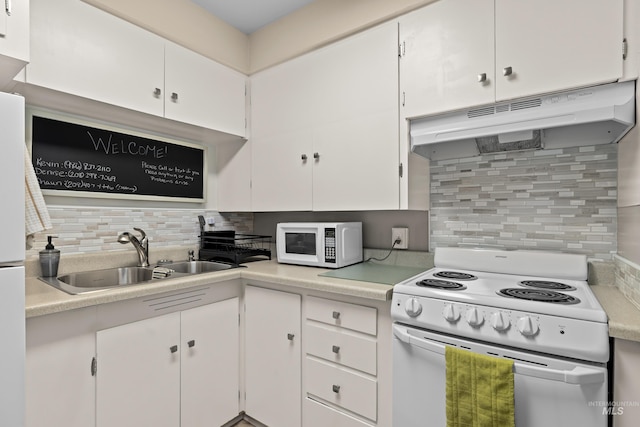 2517/2519 N 21st, Boise, ID 83702 - kitchen featuring light countertops, a sink, white cabinetry, under cabinet range hood, and white appliances