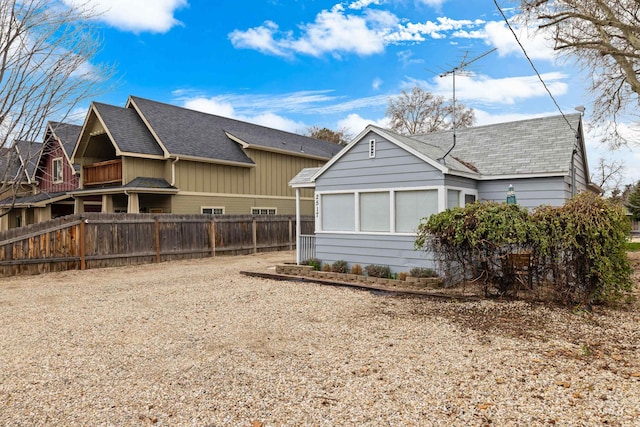 2517/2519 N 21st, Boise, ID 83702 - view of side of home featuring fence and roof with shingles