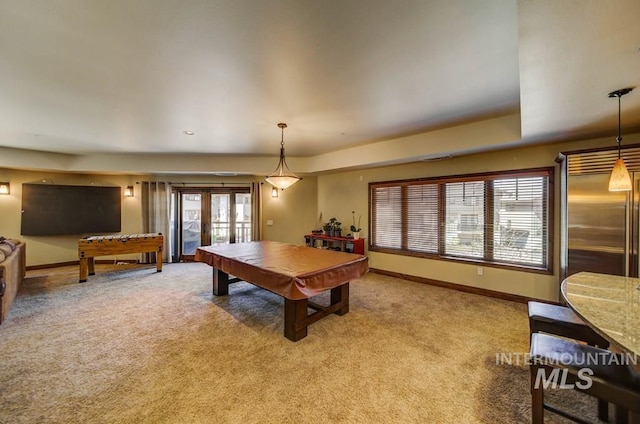 playroom featuring baseboards, light carpet, and pool table